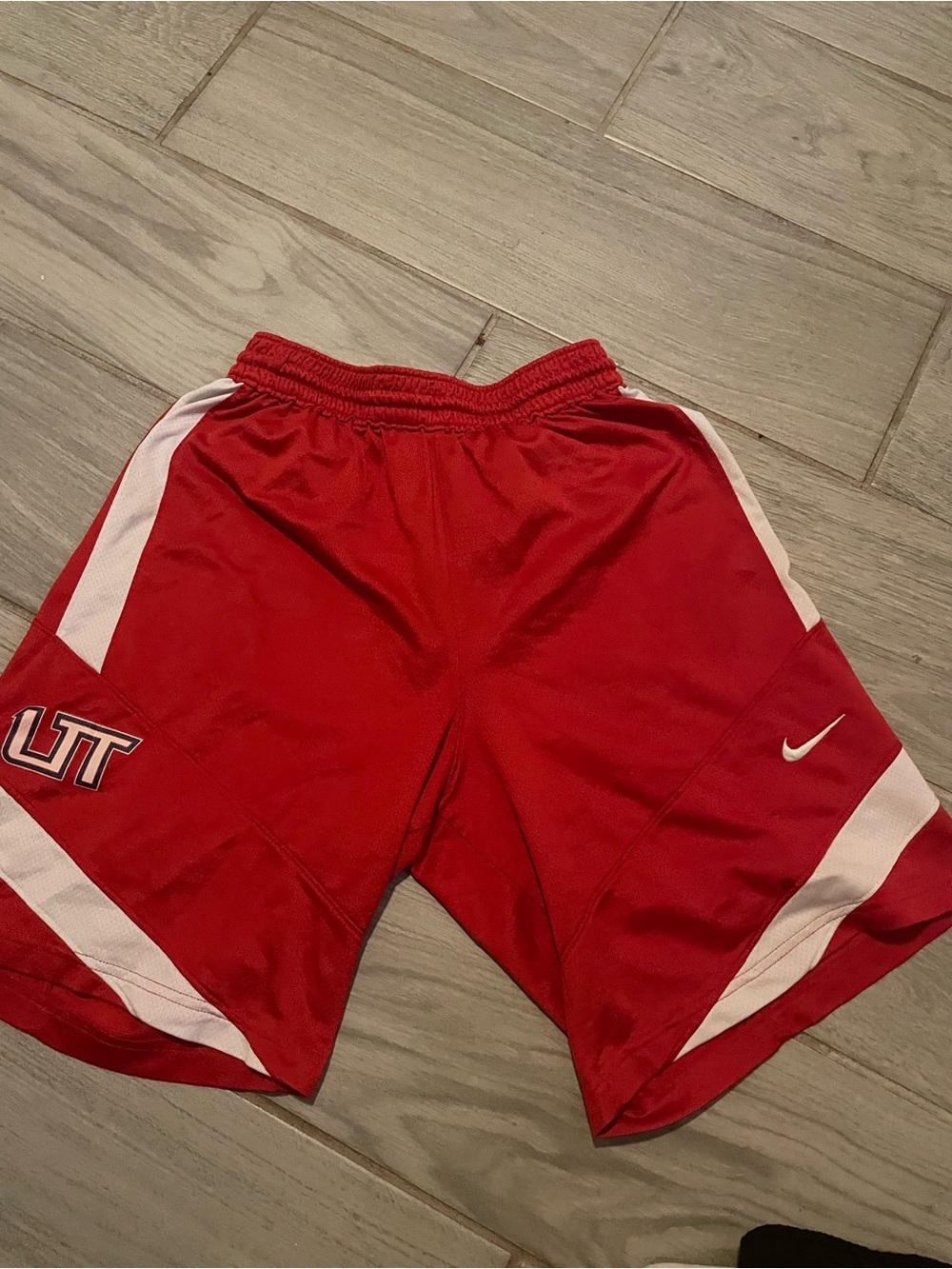 Nike Men's Red Athletic Shorts with White Panels